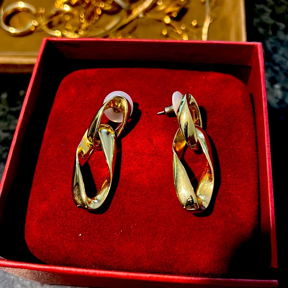 Vintage gold-plated double loop earring, pierced ears.